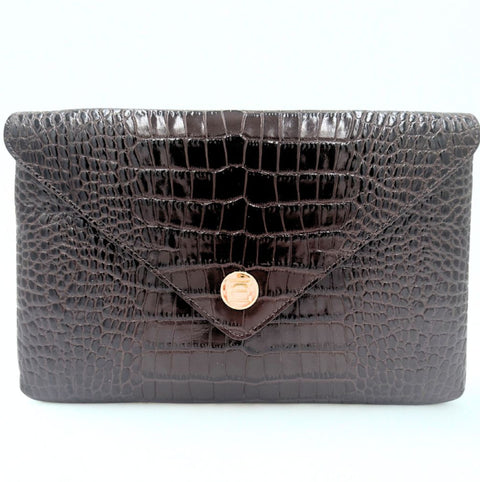 Black Embossed Croc textured Elaine Turner clutch handbag with a gold clasp on a white background