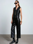 ACARIA STUDIO Ancient Poem Leather Vest in black. Available at Edit by Elaine Turner in Houston, TX. Model front view. 