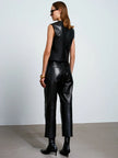 ACARIA STUDIO Ancient Poem Leather Vest in black. Available at Edit by Elaine Turner in Houston, TX. Model back view. 