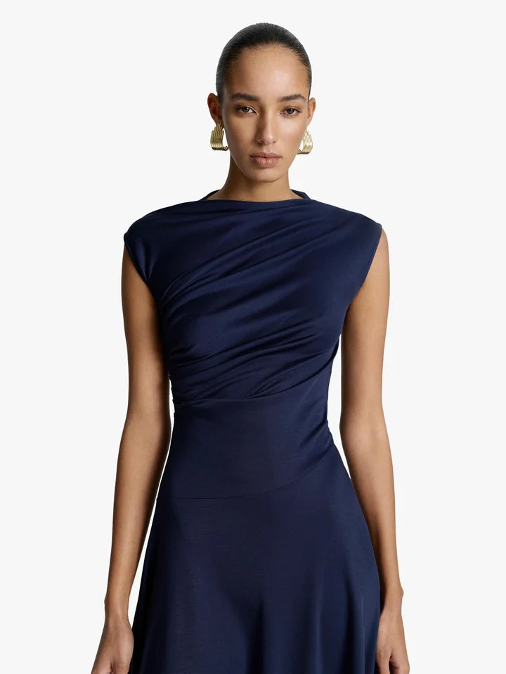 Acaria Studio - Blossom Dress in navy. Available at Edit by Elaine Turner in Houston, TX. Close up model view. 