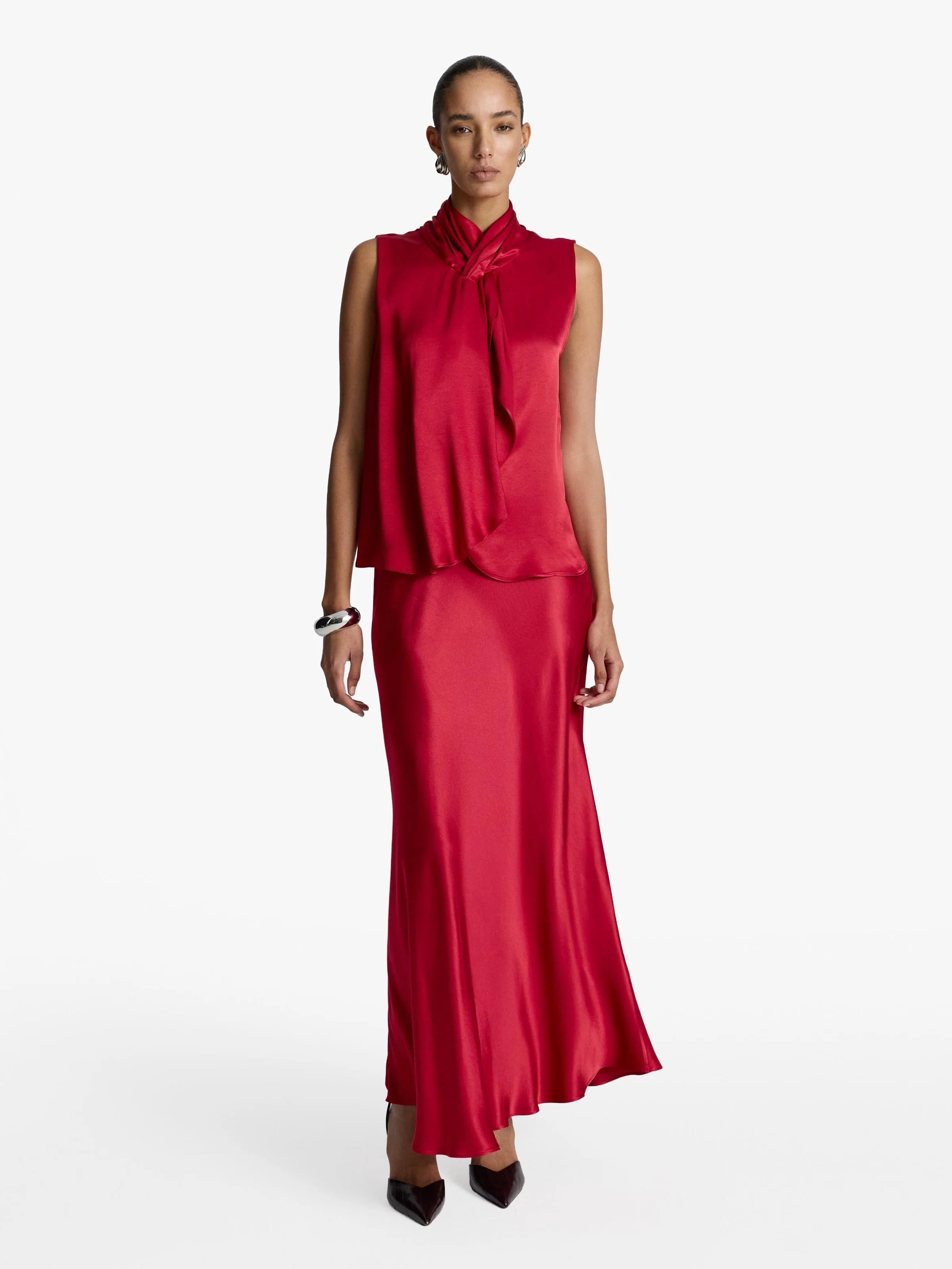 Acaria Studio- Jill Satin Skirt - Red. Available at Edit by Elaine Turner in Houston, TX. Front model view. 