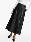 Acaria Studio Venus Leather Skirt. Available at Edit by Elaine Turner in Houston, TX. Model close up view. 