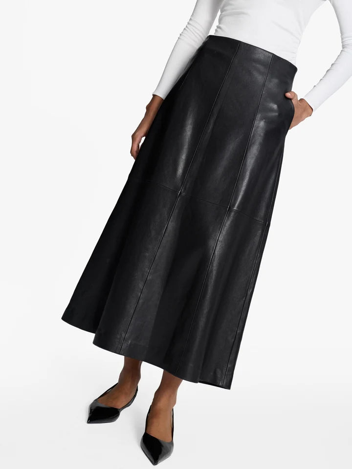 Acaria Studio Venus Leather Skirt. Available at Edit by Elaine Turner in Houston, TX. Model close up view. 