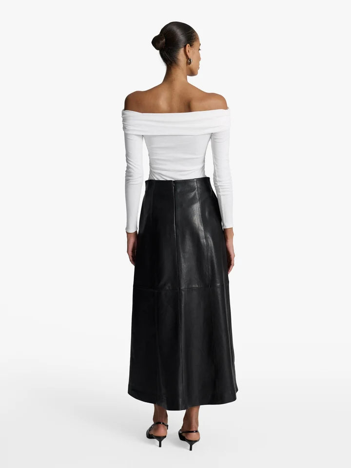 Acaria Studio Venus Leather Skirt. Available at Edit by Elaine Turner in Houston, TX. Model back view. 
