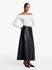 Acaria Studio Venus Leather Skirt. Available at Edit by Elaine Turner in Houston, TX. Model front view. 