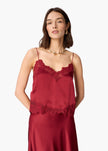 Woman wearing a deep red lace cami against a white background.
CAMI NYC Malena Camisole compote
Available at Elaine Turner in Houston, TX. front model view