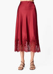 Woman wearing a deep red skirt with lace hem on a white background
CAMI NYC Vivienne Skirt compote
Available at Edit by Elaine Turner in Houston, TX.
Up close view