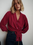 CISSA- The Slouch Wrap Cardigan in fuchsia. Available at Edit by Elaine Turner in Houston, TX. Front model view. 