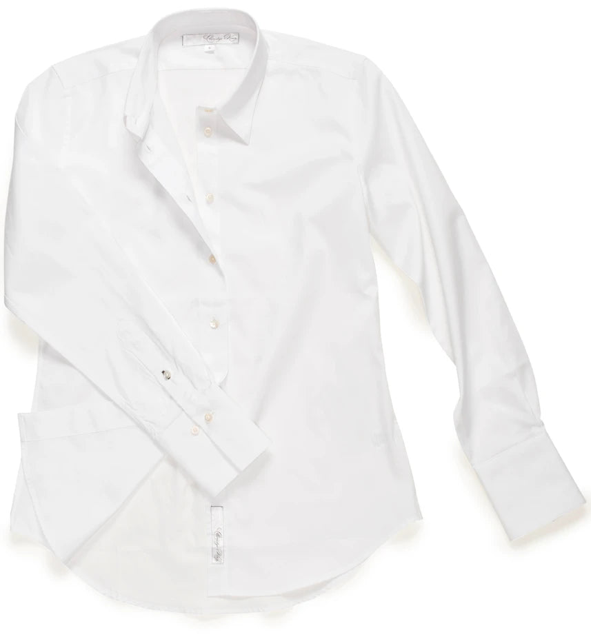 A white long-sleeve button-down dress shirt with a pointed collar and buttoned cuffs, shown on a plain white background.

Claridge & King- The Great White Shirt No. 1 - Available at Edit by Elaine Turner in Houston, TX. Flat Lay View