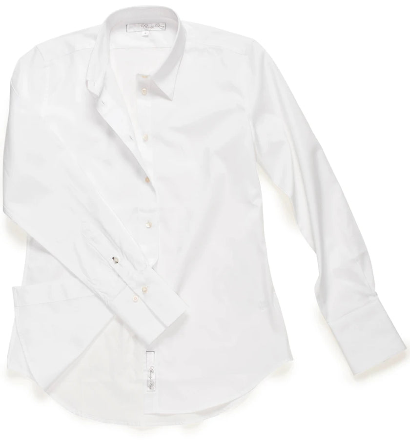 A white long-sleeve button-down dress shirt with a pointed collar and buttoned cuffs, shown on a plain white background.

Claridge & King- The Great White Shirt No. 1 - Available at Edit by Elaine Turner in Houston, TX. Flat Lay View