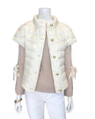 Cortland Park White puffer vest jacket at edit. BY ELIANE TURNER on a mannequin with a white background.