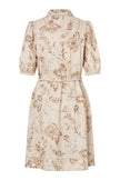 Beige floral dress on a white background. Dea Kudibal dress at edit. By Elaine Turner. Back View. 