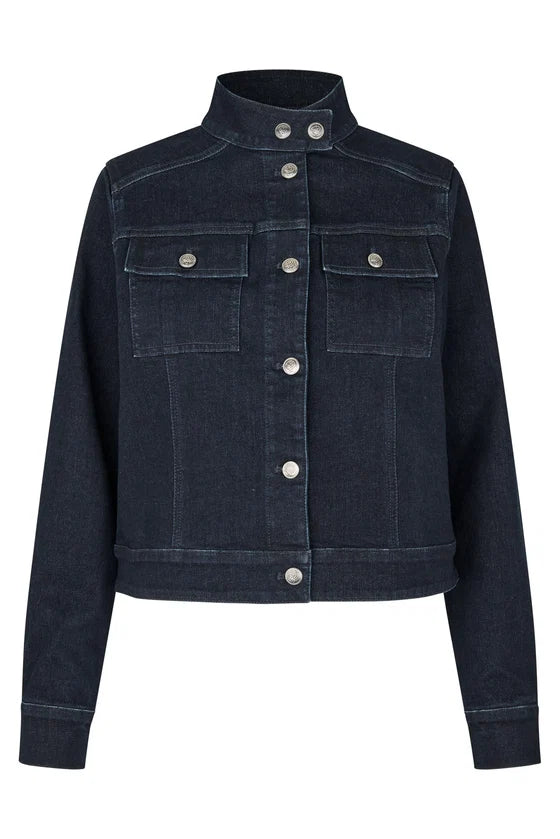 A dark navy blue cropped denim jacket with a stand-up collar, silver snap buttons, and two chest flap pockets, shown against a plain white background.

Dea Kudibal- Wilma Denim Jacket Dark Blue. Available at Edit by Elaine Turner in Houston, TX. Flat lay view. 