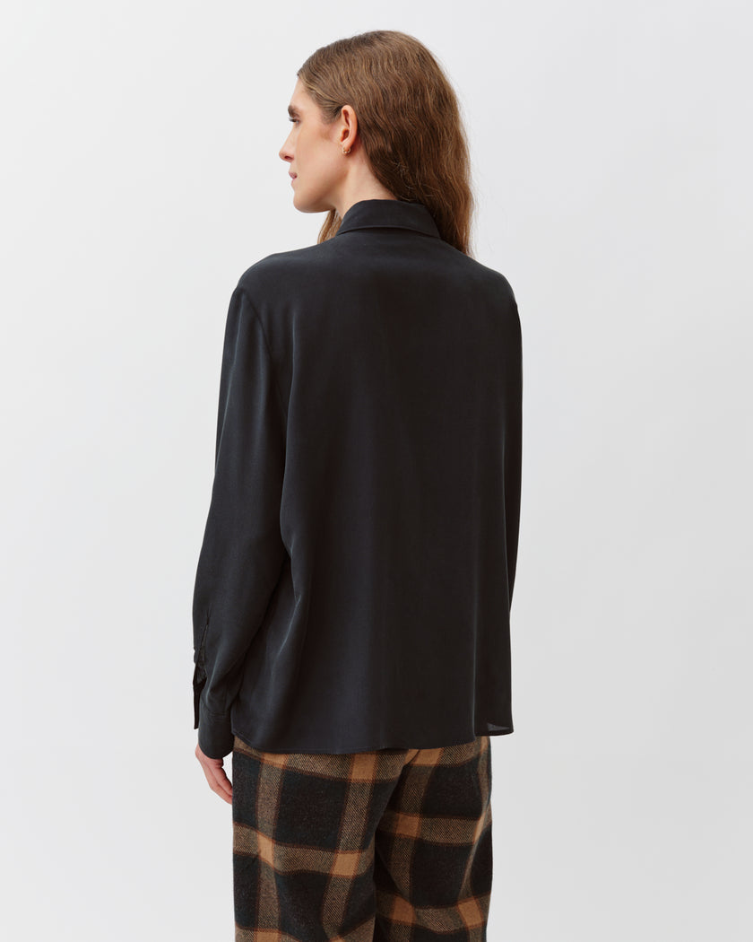 Diega Cianta Blouse in Marine. Available at Edit by Elaine Turner in Houston, TX. Full model back view. 