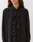 Diega Cianta Blouse in Marine. Available at Edit by Elaine Turner in Houston, TX. Close up view. 