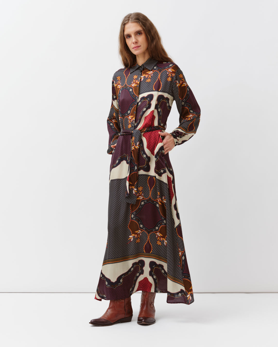 Diega Riora Dress in Marine, Rouge and Ecru Colors. Available at Edit by Elaine Turner in Houston, TX. Full model side view. 