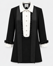A black structured tuxedo-style dress with a white shirt collar, white front buttons, black beaded trim, and matching black beaded cuffs, shown on a light gray background.

Edward Achour Extended Length Shift Dress with Contrast Bib in Black. Available at Edit by Elaine Turner in Houston, TX. Front flat lay view. 