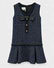 A sleeveless navy blue and black tweed mini dress, featuring a black bow at the V-neckline, three gold buttons, and a flared ruffled hem.

Edward Achour sleeveless tweed mini dress with ruffle hem. Available at Edit by Elaine Turner in Houston, TX. Front Flat Lay View. 