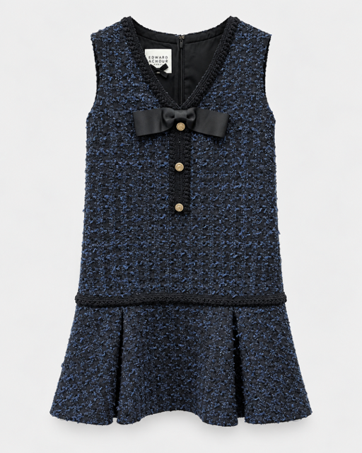 A sleeveless navy blue and black tweed mini dress, featuring a black bow at the V-neckline, three gold buttons, and a flared ruffled hem.

Edward Achour sleeveless tweed mini dress with ruffle hem. Available at Edit by Elaine Turner in Houston, TX. Front Flat Lay View. 