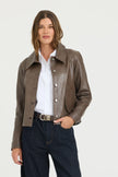 JAKETT- Emmy Patina Leather Jacket in Carob. Available at Edit by Elaine Turner in Houston, TX. Front model view. 