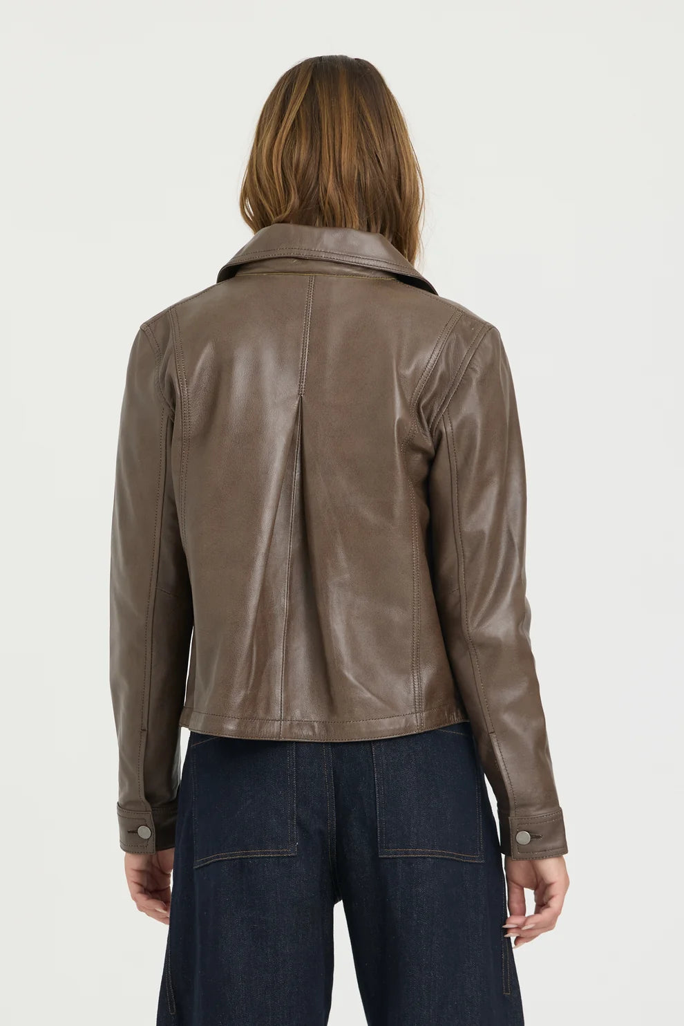 JAKETT- Emmy Patina Leather Jacket in Carob. Available at Edit by Elaine Turner in Houston, TX. Back model view. 