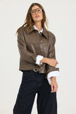JAKETT- Emmy Patina Leather Jacket in Carob. Available at Edit by Elaine Turner in Houston, TX. Front model view. 