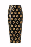 Le Superbe - Liza Skirt in Noir Marigold. Available at Edit by Elaine Turner in Houston, TX. Flat lay view. 