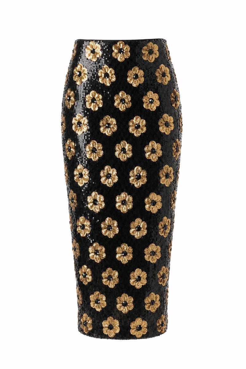 Le Superbe - Liza Skirt in Noir Marigold. Available at Edit by Elaine Turner in Houston, TX. Flat lay view. 