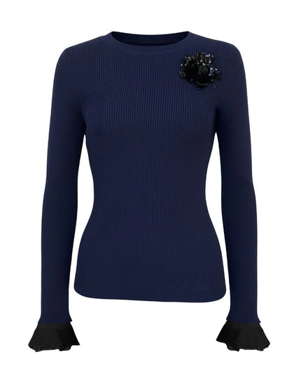 Extra Crew A La Carte Sweater in navy blue with black trim on cuffs and collar with a sequin embellishment against a white background by Le Superbe at edit. BY ELAINE TURNER. 