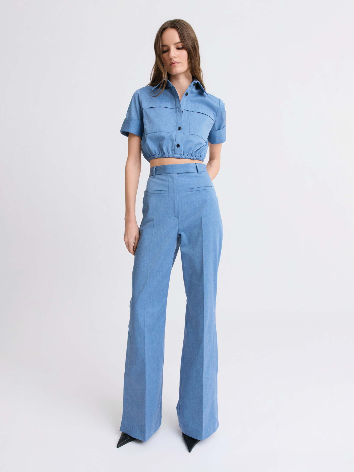 Matthew Bruch- Side Slit Bell Bottom Trouser - Slate Blue. Available at Edit by Elaine Turner in Houston, TX. Front Model View. 
