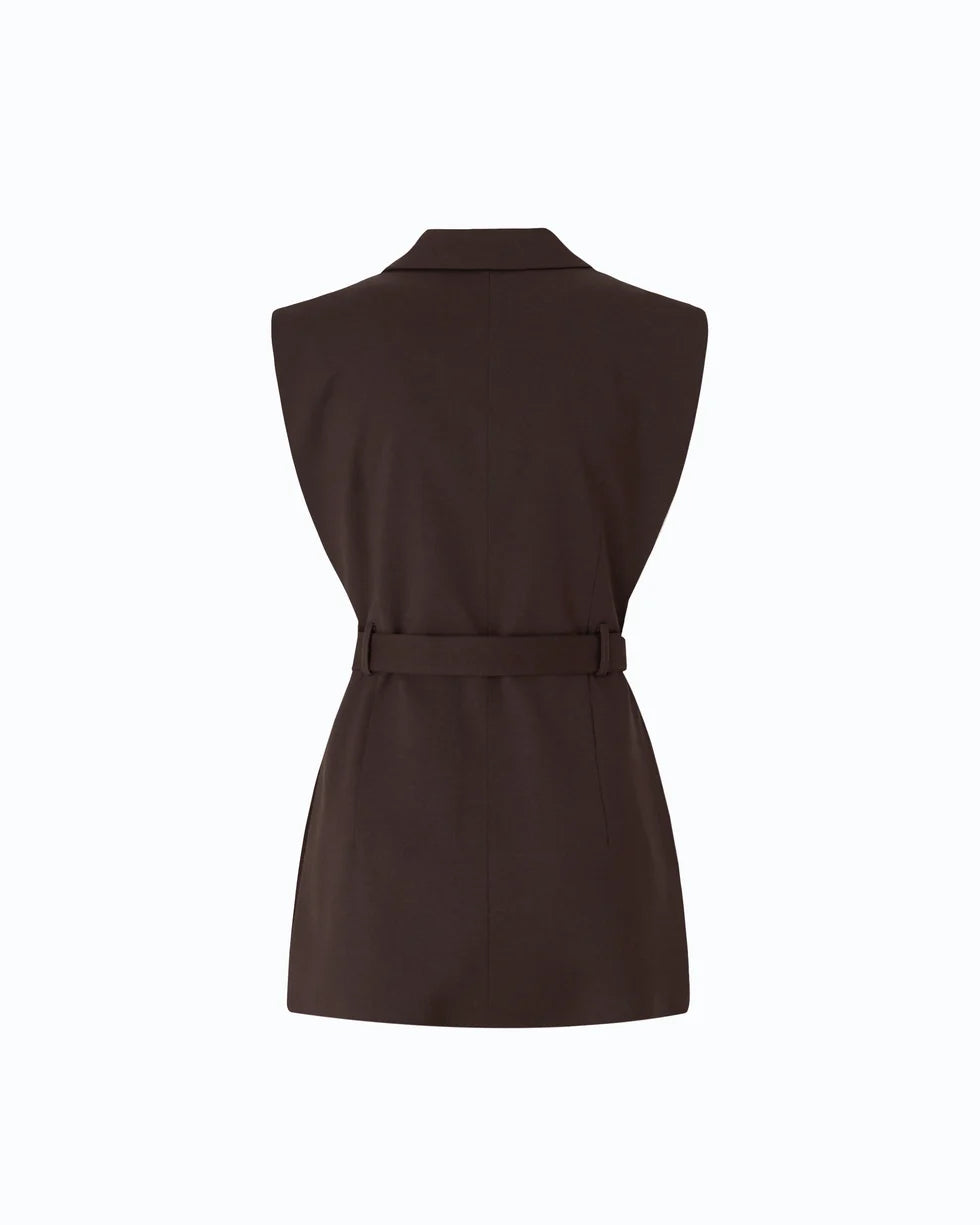 A sleeveless dark brown blazer-style top with a matching waist belt, shown from the back on a plain white background.

PIINKO- Vest with Open Sides and Belt in Beyond the Dark Brown. Available at Edit by Elaine Turner in Houston, TX. Back Flat Lay View. 