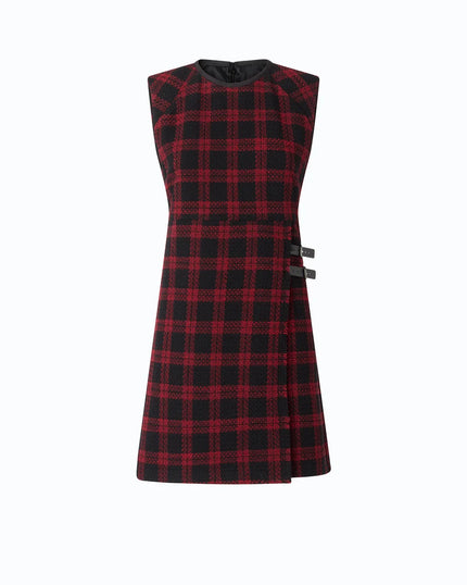 A sleeveless red and black plaid dress with a black collar and side buttons, shown against a plain white background.

Pinko Amaranda Abito Tweed dress in black/white. Available at Edit by Elaine Turner in Houston, TX. Front View. 
