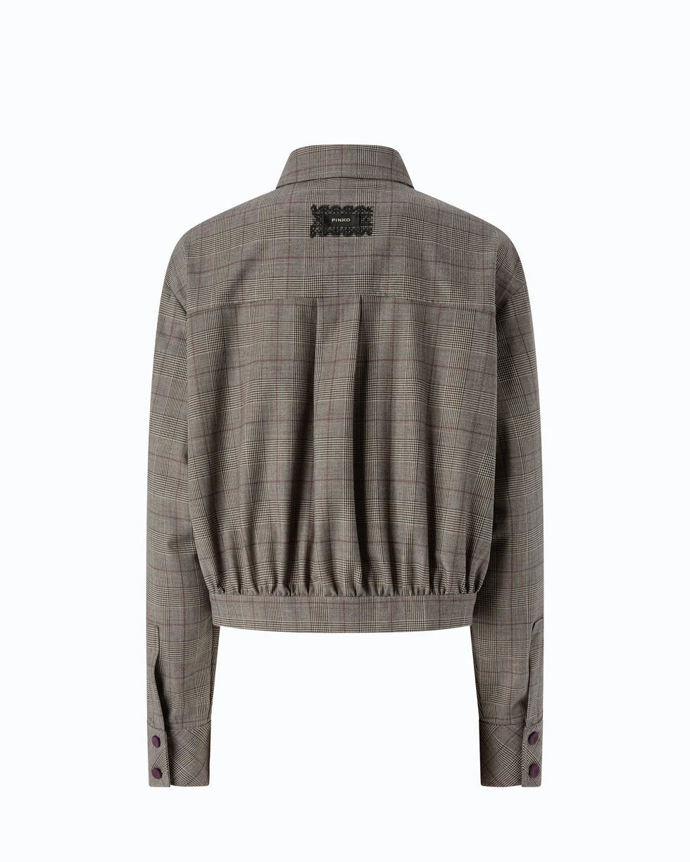 A cropped long-sleeve plaid jacket shown from the back, featuring a gathered waist and a black embroidered logo patch on the upper back, set against a plain white background.

Pinko Oncidium Overshirt Misto Lana in beige/bordeaux/black. Available at Edit by Elaine Turner in Houston, TX. Back View. 