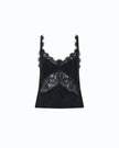 A black lace camisole top with delicate floral lace detailing and ruffled trim, displayed against a solid white background.
Pinko Tiare Top Jacquard Crinkle Black. Available at Edit by Eaine Turner in Houston, TX. Front View. 