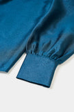 Psophia- Fluid Victorian Sleeve Blouse with bow detail and central ruffle - Night Color. Available at Edit by Elaine Turner in Houston, TX. Close Up Flat Lay View. 