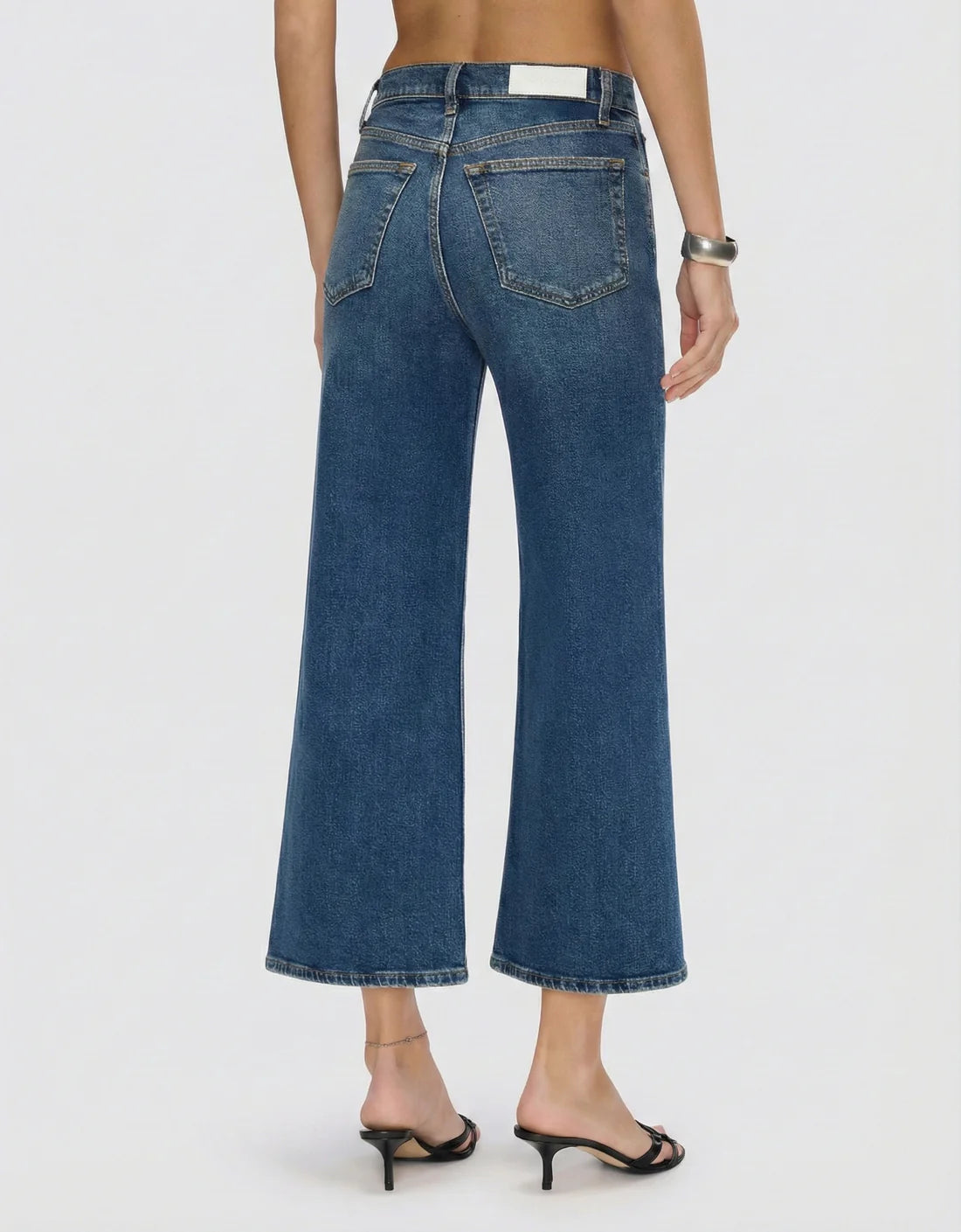 RE/DONE High Rise Wide Leg Crop Mid 70s. Available at Edit by Elaine Turner in Houston, TX. Back View. 