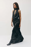 Sabina Musayev- Marie Dress in Midnight Silver. Available at Edit by Elaine Turner in Houston, TX. Side model view. 