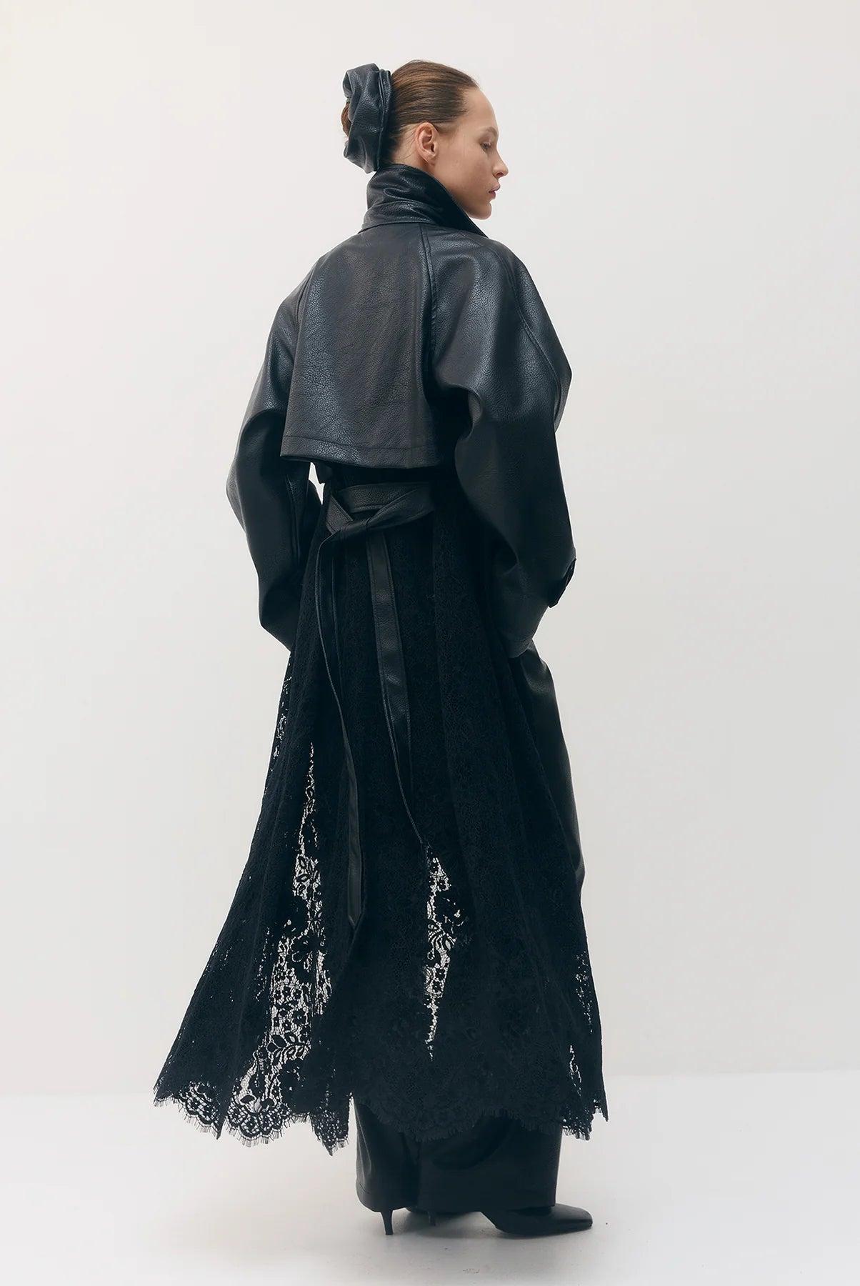 Sabina Musayev- Sable Jacket in black. Available at Edit by Elaine Turner in Houston, TX. Model side view. 