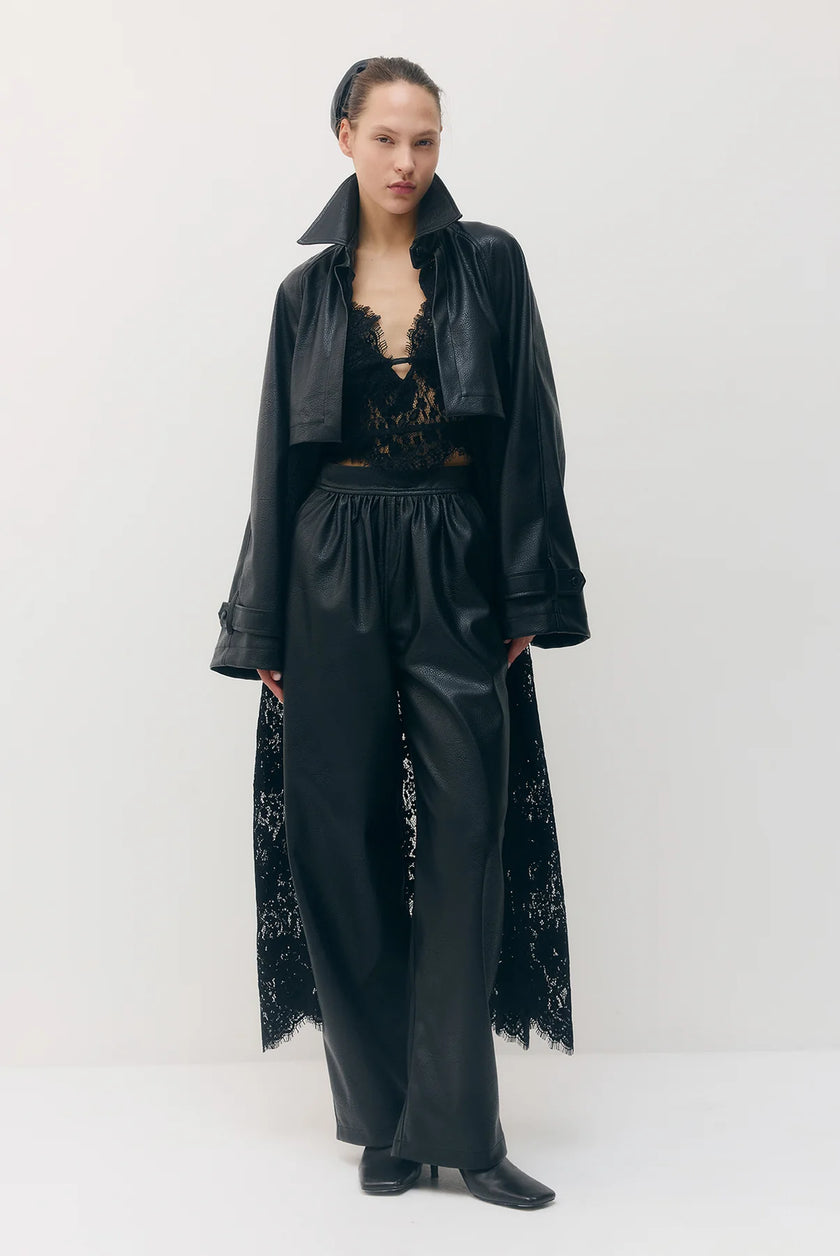 Sabina Musayev- Sable Jacket in black. Available at Edit by Elaine Turner in Houston, TX. Front model view. 