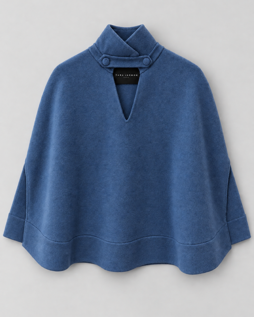 Maddie Cape - Denim Blue - Flat Lay View. Available at Edit by Elaine Turner in Houston, TX. 