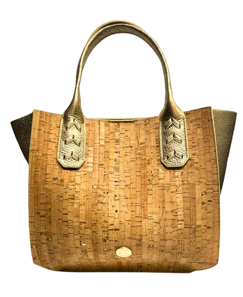 Elaine Turner Mauney Satchel handbag in iconic cork material and gold Italian pebble leather trim, featuring curved handles and a detachable strap.