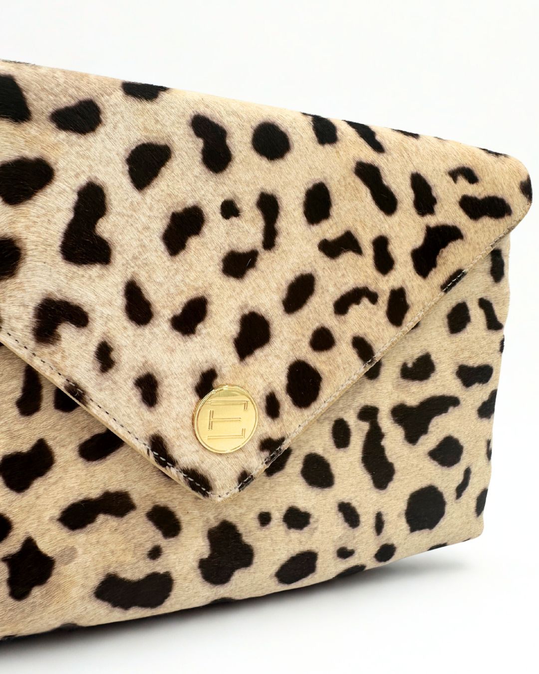 Elaine Turner- Bella Clutch- Ocelot Snow Leopard Haircalf - Edit by Elaine Turner